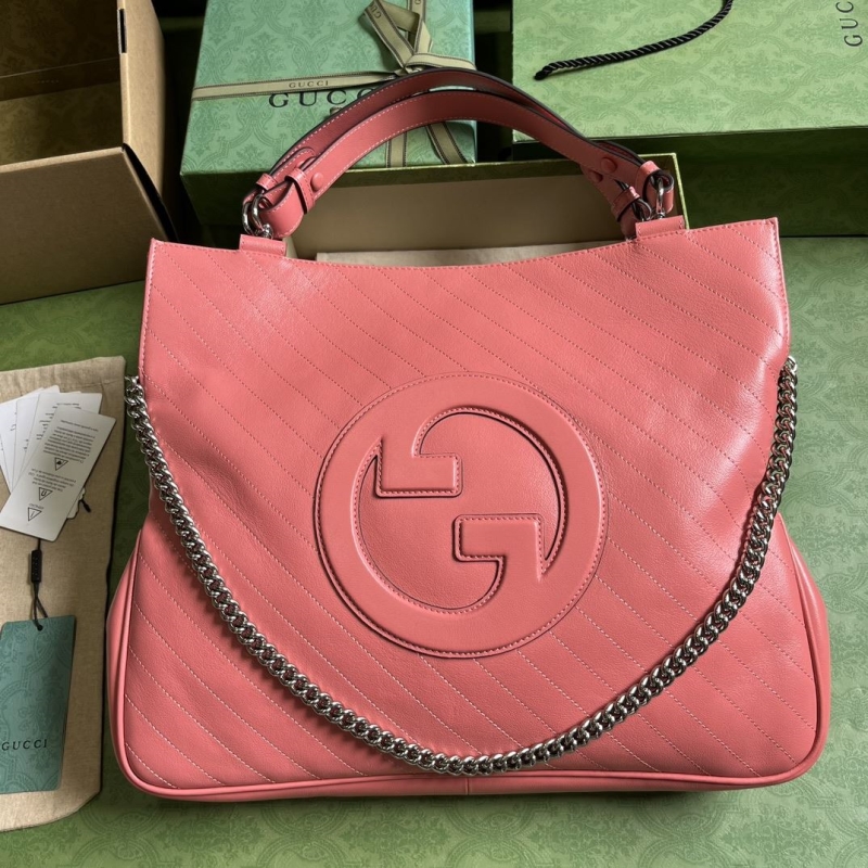 G*u*i top handle bags